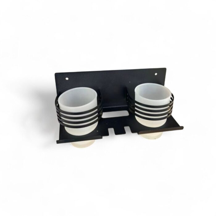 Double tumbler with toothbrush holder