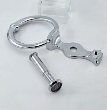 silver door knocker with door viewer