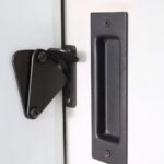 Concealed barn door handle with lock