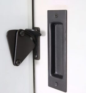 Concealed barn door handle with lock