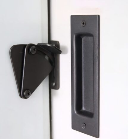 Concealed barn door handle with lock